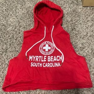 A cropped “muscle” shirt